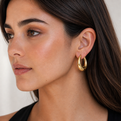 Regal Wave Gold Plated Statement Earrings