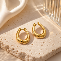 Regal Wave Gold Plated Statement Earrings