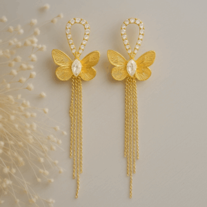 Radiant golden butterfly with chain earring