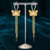 Radiant golden butterfly with chain earring